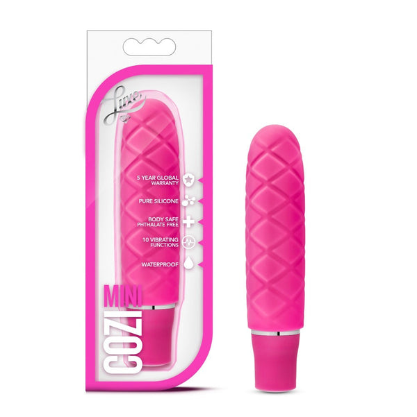 Blush Luxe Cozi Mini vibrator in fuchsia pink with quilted silicone texture, shown beside retail box