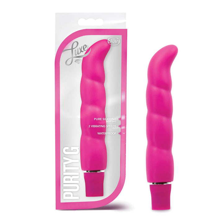 Blush Luxe Purity G pink silicone vibrator beside its retail packaging, showing curved ribbed design