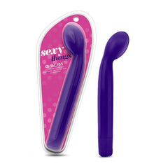Blush Novelties Sexy Things G Slim vibrator in purple beside its pink polka-dot packaging