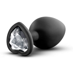 Blush Novelties Temptasia plug tilted to show sparkling clear heart-shaped crystal gem base detail