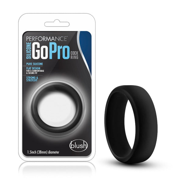 Blush Performance Silicone Go Pro Cock Ring in black, flat wide-band design, beside retail packaging