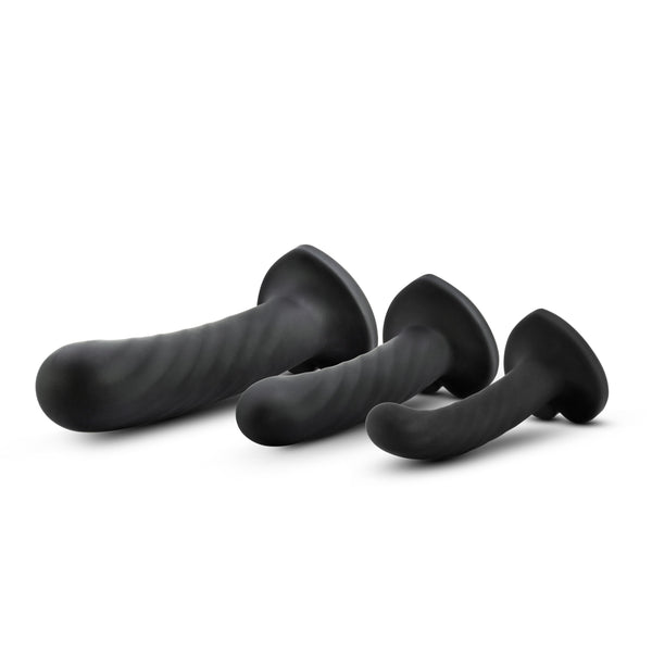 Blush Temptasia Twist Kit three black silicone dildo set with suction cup bases, angled view