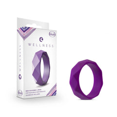 Blush Wellness Geo Silicone C-Ring in purple with faceted geometric texture, shown with box