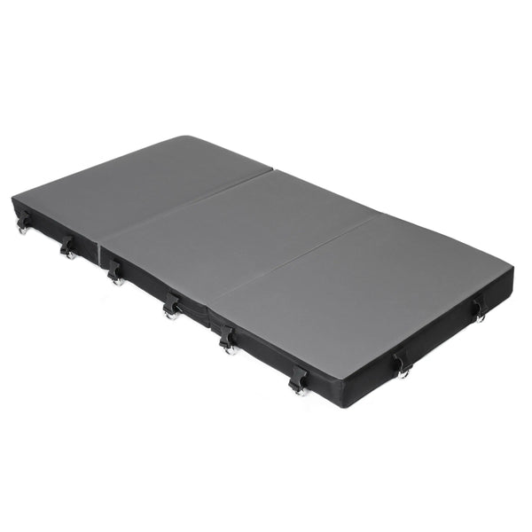Liberator Bondi Portable Playscape unfolded flat, grey vinyl surface with black padded base and D-rings