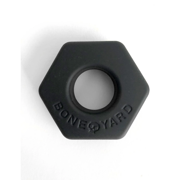 BoneYard Bust-A-Nut black silicone cock ring, hexagonal nut shape, front view