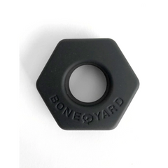 BoneYard Bust-A-Nut black silicone cock ring, hexagonal nut shape, front view