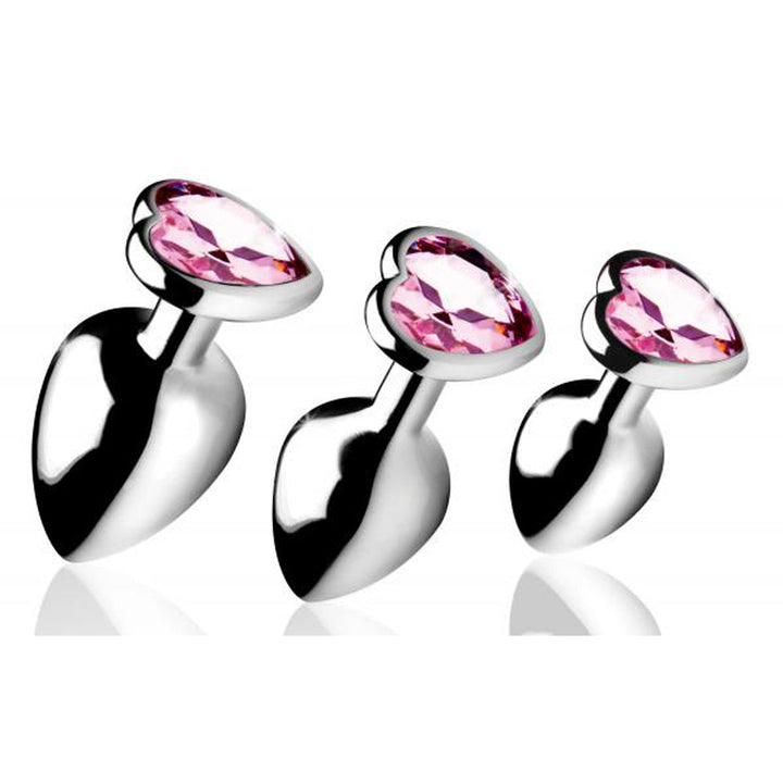 Booty Sparks Pink Heart Gem Anal Plug Set, three polished silver plugs with pink crystal hearts