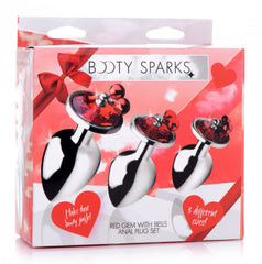 Booty Sparks Red Gem with Bells Anal Plug Set shown in festive red retail packaging