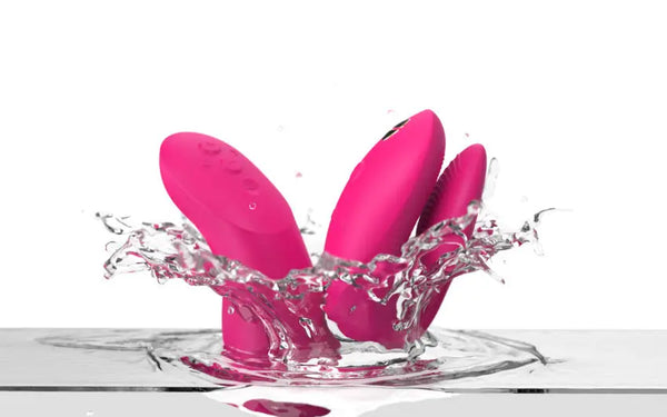 Both We-Vibe Chorus Pro silicone pieces splashing through water, highlighting waterproof design