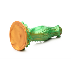 Bottom angle of alien silicone dildo displaying flat amber suction cup base clearly