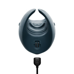 Bottom charging port of Pulse Duo shown with magnetic USB cable attached, matte silicone body