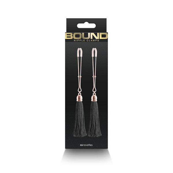 Bound Nipple Clamps T1 in black packaging by NS Novelties, rose gold and black tassel design