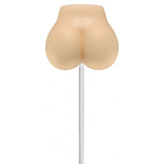 Butter rum flavoured Candy Ass novelty lollipop out of packaging, smooth peach-toned finish