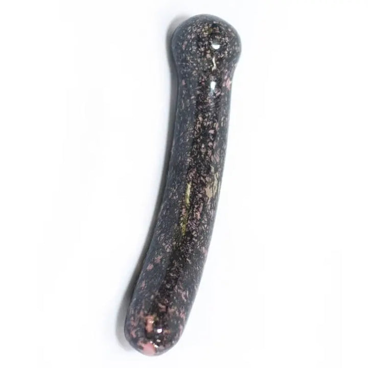 Chakrubs Anahata Curve rhodonite crystal dildo with dark speckled pink mineral finish