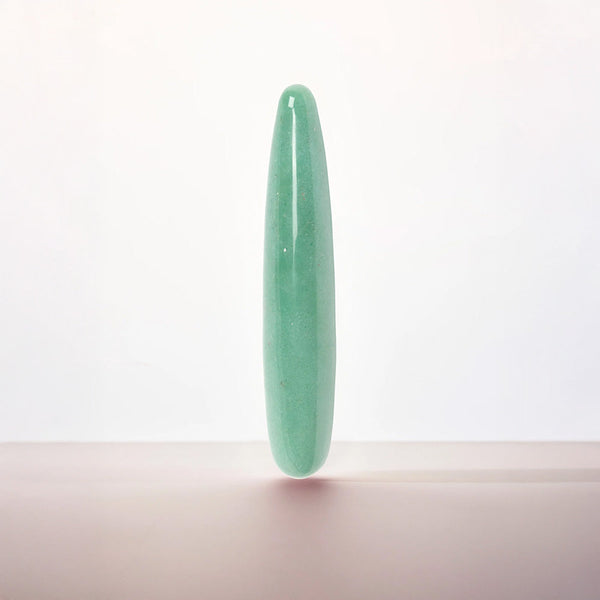 Chakrubs Indian Jade Aventurine Slim crystal wand standing upright, smooth mint-green stone