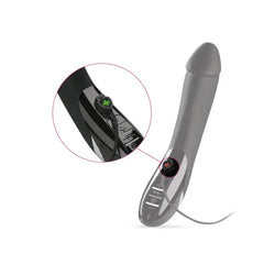 Charging port detail on Tickling Truman with magnified view of illuminated power button
