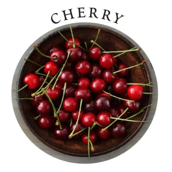 Cherry flavor label showing fresh red cherries in a wooden bowl for the edible massage candle