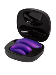 Chorus Pro cosmic purple vibrator set nestled in open black storage and charging case