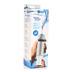 CleanStream Enema Syringe with Tube shown in branded retail packaging, hand holding product