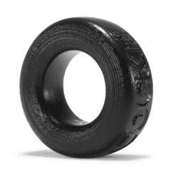 Close-up of COCK-T cock ring texture detail revealing fine layered silicone surface