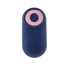 Compact navy blue wireless remote control with rose gold power button for the Extra Mile