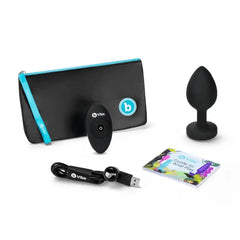 Complete b-Vibe Jewel Plug XXL kit with storage pouch, remote, cable, and guide