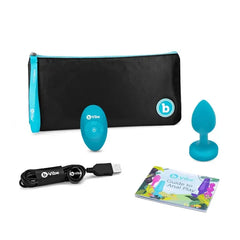 Complete b-Vibe kit: plug, remote, USB cable, storage pouch, and anal play guide