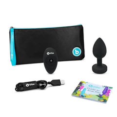 Complete b-Vibe kit with storage pouch, remote, USB cable, and anal play guide