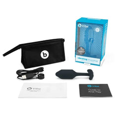 Complete b-Vibe Snug Plug 2 kit with storage bag, USB cable, and instruction booklets