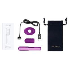 Complete Grand Bullet set with bullet, sleeves, USB charger, instruction booklet, and storage pouch