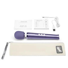 Complete Le Wand Petite Massager set with device, pouch, USB cable, and instruction guides