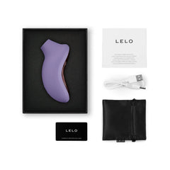 Complete LELO Sona 3 unboxed with USB charging cable, storage pouch, and warranty card