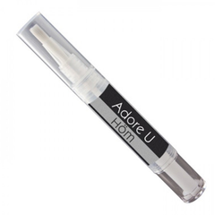 Control Brush applicator pen close-up showing Adore U Höm label and brush tip detail