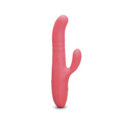 Coral pink Le Wand Thrust rabbit vibrator, slight side angle highlighting ribbed shaft texture