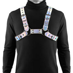 Cosmo Rogue chest harness in holographic faux leather with silver studs, front view on male model