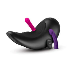 Cowgirl Saddle machine displayed with pink and purple silicone attachments and remote control