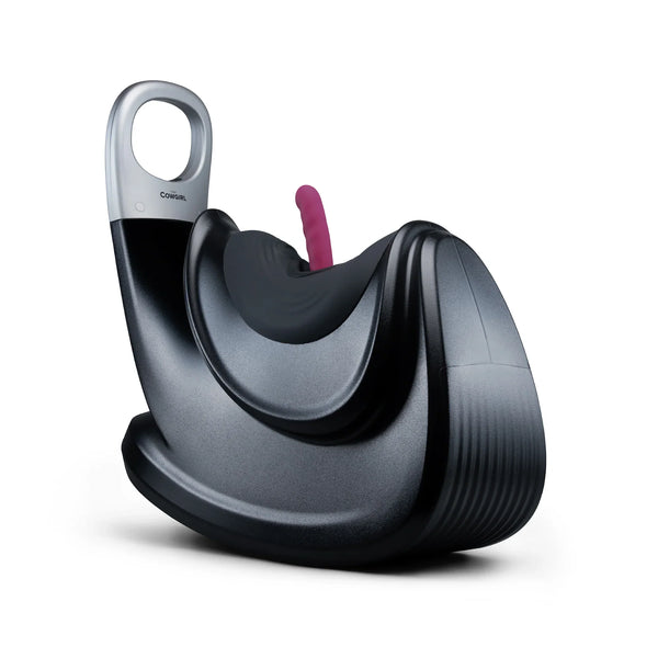 The Cowgirl Thrust Rider riding massager in matte black with silver handle and burgundy attachment