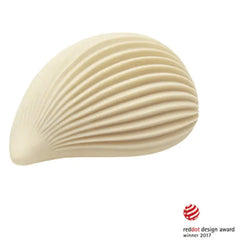 Cream-coloured Iroha Kushi vibrator showing ribbed shell-inspired silicone surface