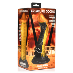 Creature Cocks Golden Mamba silicone dildo shown beside its retail packaging box with product imagery