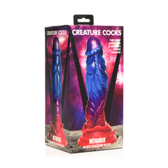 Creature Cocks Intruder alien silicone dildo shown beside its retail packaging box