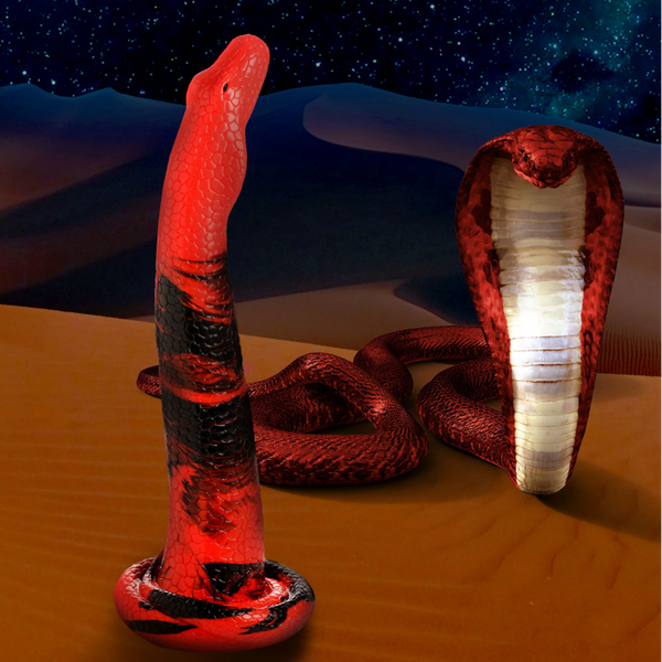 Creature Cocks King Cobra 14-inch red and black silicone dong with snake coil base, desert backdrop