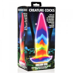 Creature Cocks Unicorn Kiss Glow-in-the-Dark Silicone Dildo shown beside its retail packaging box