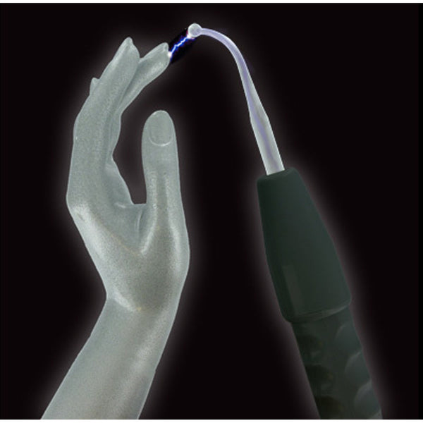 Curved glass electrode tip emitting violet spark near a hand, demonstrating e-stim sensation