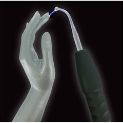 Curved glass electrode tip emitting violet spark near a hand, demonstrating e-stim sensation
