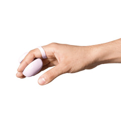 Dame Fin 2.0 worn on index finger with tether looped around, side grip position shown