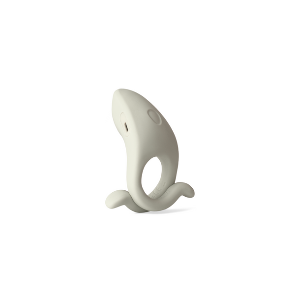 Dame Hug vibrating cock ring in fog, upright front view showing squishy tip and flexible silicone body