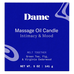 Close-up of Dame Massage Oil Candle box front, Intimacy and Mood, 141 g net weight
