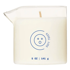 Dame Massage Oil Candle Soft Touch in clear square glass jar with wooden wick, 5 oz