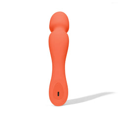 Dame Min Mini Wand in papaya orange showing back profile with USB-C charging port at base