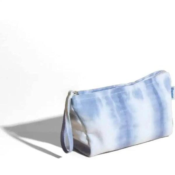 Dame Stash Skye Toy Pouch in blue tie-dye with silver zip and wrist strap